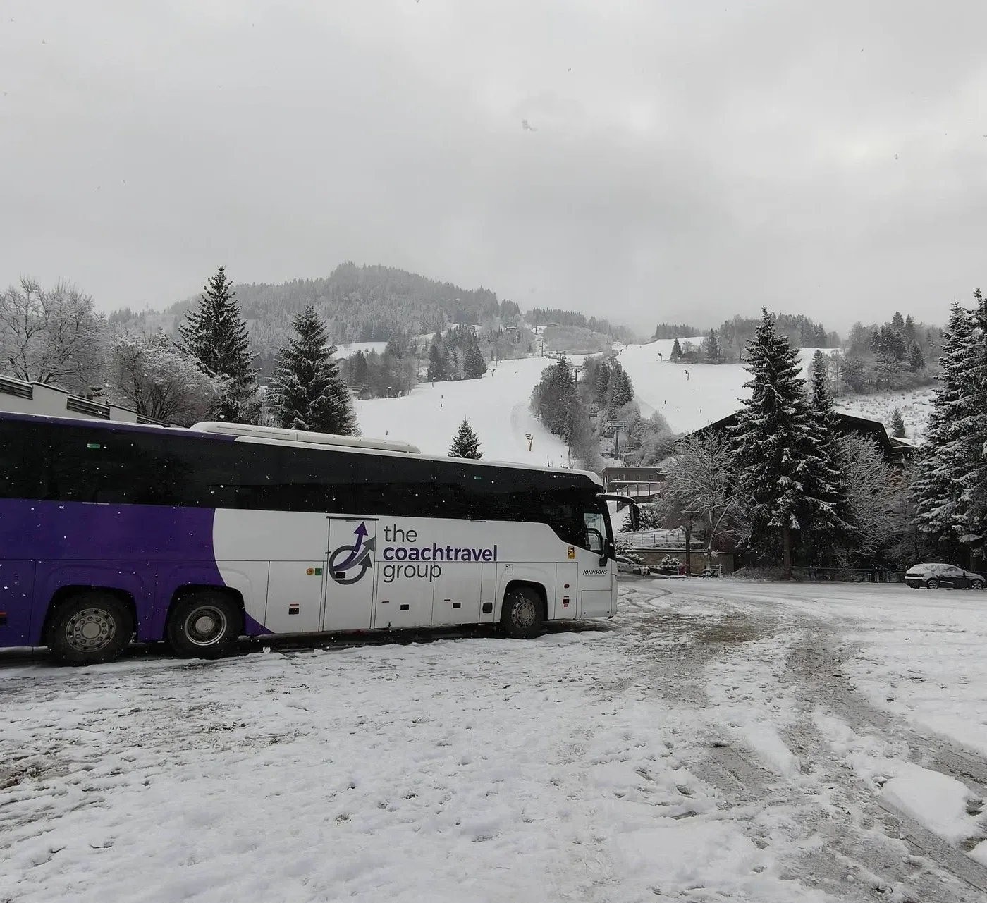 Coach travel group in snow
